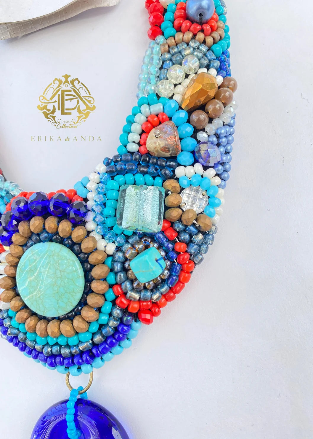 COLLAR DE OJO DE CRISTAL CON ARETES